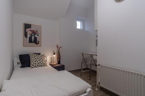 Katil atau katil-katil dalam bilik di Apartments Park Šiška Ljubljana