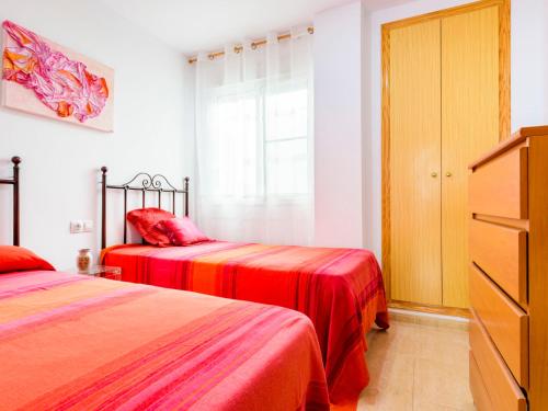 Ένα ή περισσότερα κρεβάτια σε δωμάτιο στο Apartment Jardimar by Interhome