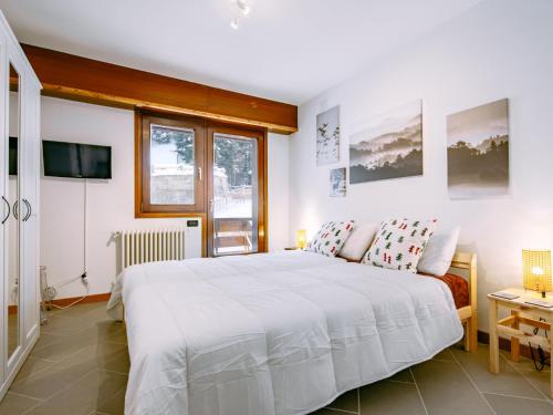 Postel nebo postele na pokoji v ubytování Apartment Appartamento 29 by Interhome