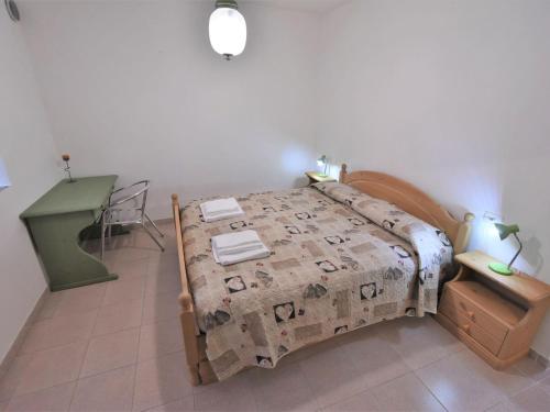 Postel nebo postele na pokoji v ubytování Apartment Anna by Interhome