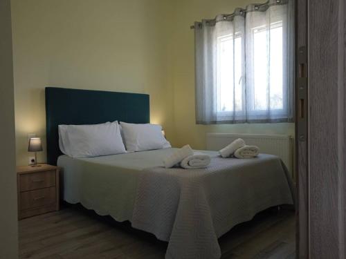 Postel nebo postele na pokoji v ubytování Spiridoula Luxury Villa
