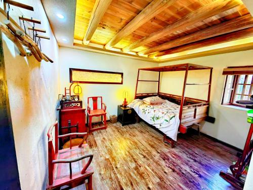 Katil atau katil-katil dalam bilik di Tulou Fuyulou Changdi Inn