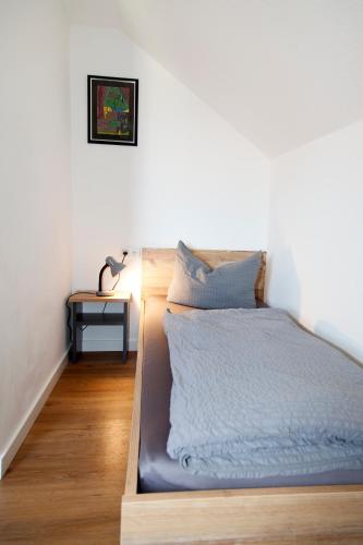 Ένα ή περισσότερα κρεβάτια σε δωμάτιο στο Stadl Appartements