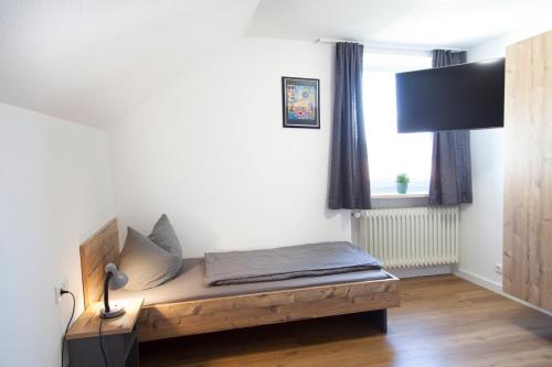 Ένα ή περισσότερα κρεβάτια σε δωμάτιο στο Stadl Appartements