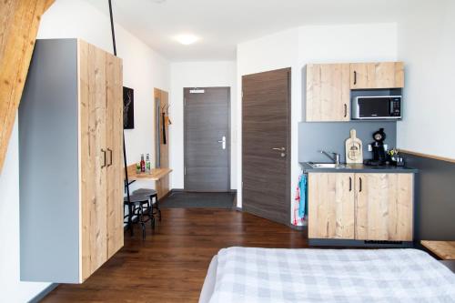Η κουζίνα ή μικρή κουζίνα στο Stadl Appartements