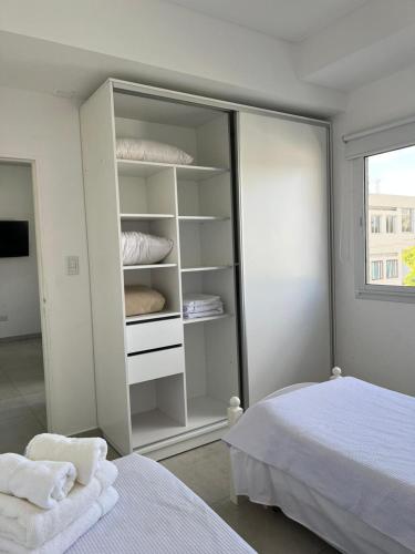 Ένα ή περισσότερα κρεβάτια σε δωμάτιο στο Apart hotel Magda