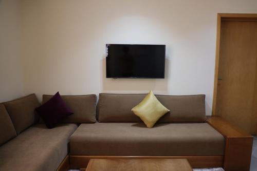 RESIDENCE CENTROSUITにあるテレビまたはエンターテインメントセンター