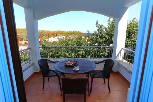 Μπαλκόνι ή βεράντα στο Vathi Hotel Apartment Hotel