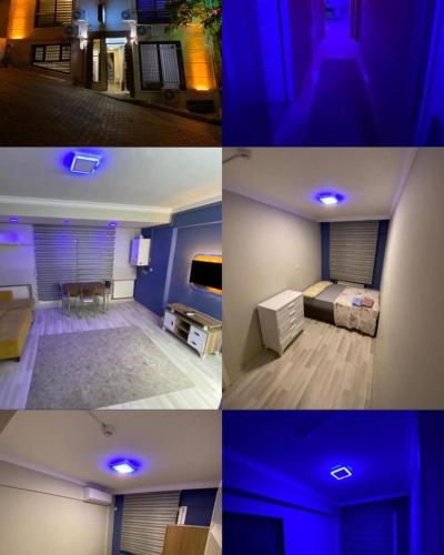 Habitación con cama y habitación con luces azules en 8 Plus Apart en Buca