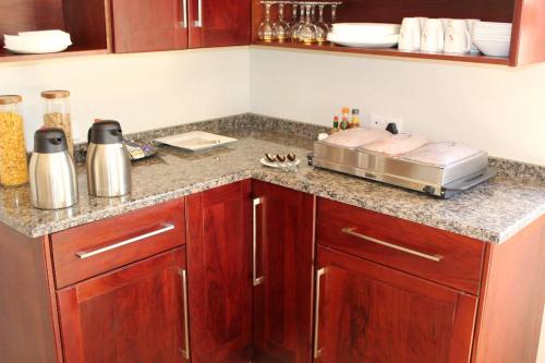 a kitchen with a counter with a toaster on it at A pristine BB located in Belvedere Harare - 2010 in Harare