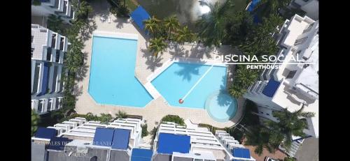 an overhead view of a swimming pool in a building at Cristales del Mediterraneo in Girardot
