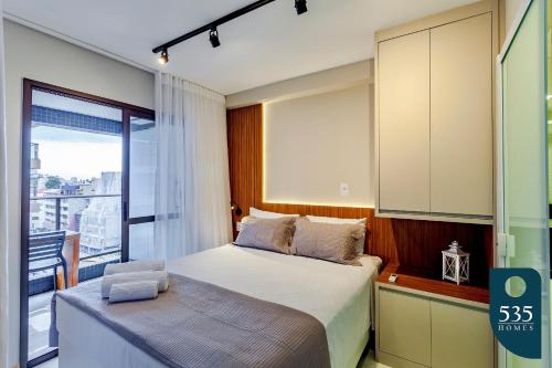 Кровать или кровати в номере Lindo apartamento próximo à praia e Farol da Barra