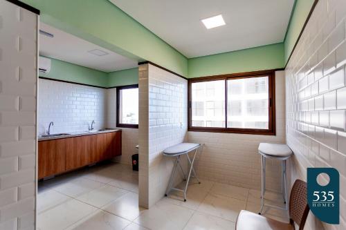 Ванная комната в Lindo apartamento próximo à praia e Farol da Barra