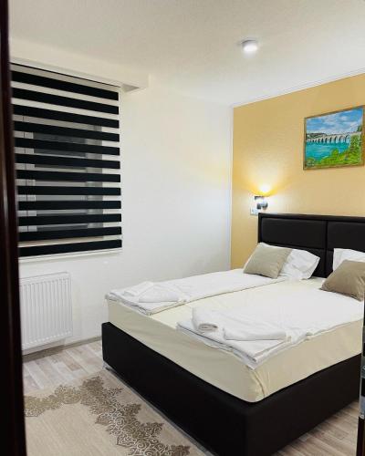 Postel nebo postele na pokoji v ubytování Hotel Casablanca