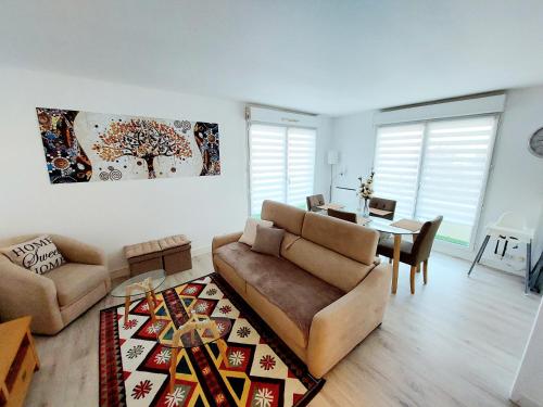 Χώρος καθιστικού στο Cosy Home 1 - Spacieux 3 pièces avec parking - 30 min de Paris