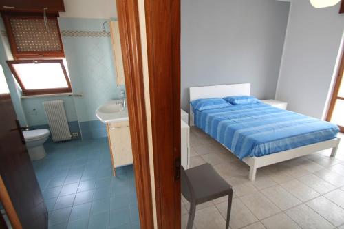 Postel nebo postele na pokoji v ubytování Attico Del Vico