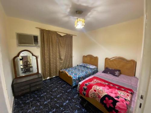 Llit o llits en una habitació de Ganna Misr