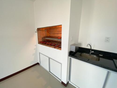 Una cocina o zona de cocina en Victoria Apart & Suites