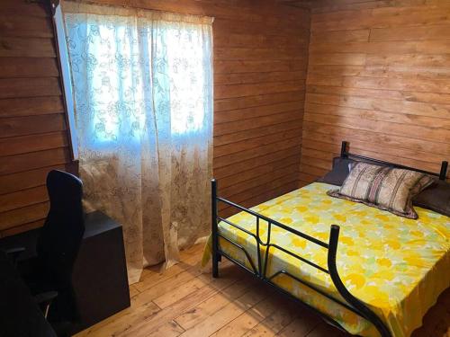 Letto o letti in una camera di Cabaña Aurora – COZY Cabin with an Amazing view!