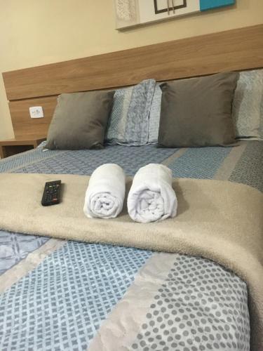 Ein Bett oder Betten in einem Zimmer der Unterkunft Pousada Morada Dusanjos