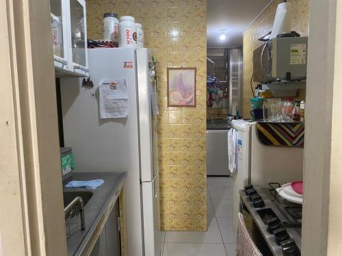 Una cocina o zona de cocina en Apartamento em Copacabana