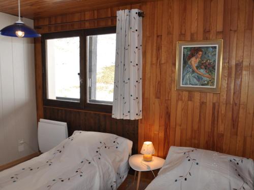 Posteľ alebo postele v izbe v ubytovaní Appartement cosy au cœur de Châtel, proche télécabine et activités avec Multi Pass à 3€/jour! - FR-1-693-69