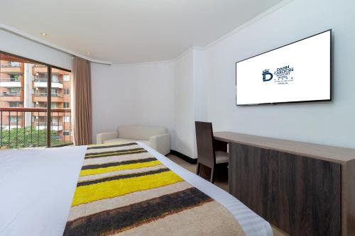 Uma cama ou camas num quarto em Hotel Dann Carlton Belfort Medellin