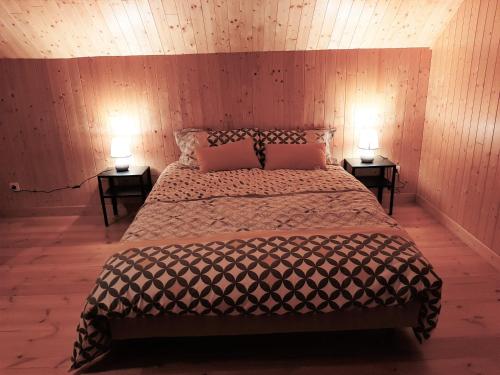 Posteľ alebo postele v izbe v ubytovaní Le chalet de Pierrot
