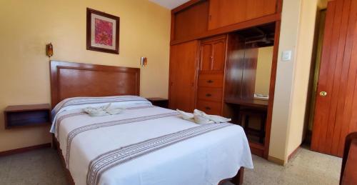 Кровать или кровати в номере Hotel Florida Oaxaca