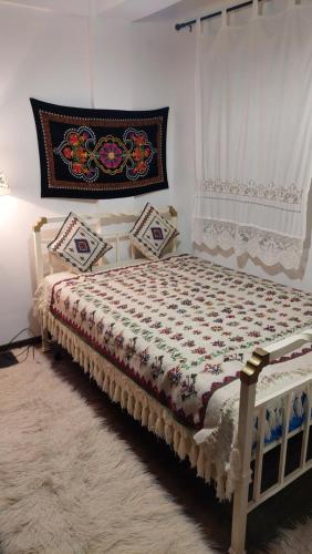 Ένα ή περισσότερα κρεβάτια σε δωμάτιο στο Αρχοντικό Βαρσάνη