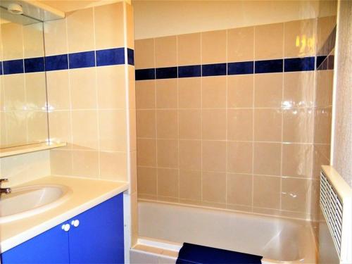a bathroom with a tub and a sink and a shower at Maison duplex avec terrasse, piscine chauffée, 6 pers., Vallon-Pont-d'Arc. - FR-1-382-21 in Vallon-Pont-dʼArc