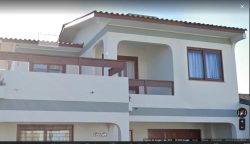 a) Rendimiento de una casa con en Casa ideal para suas férias en Torres
