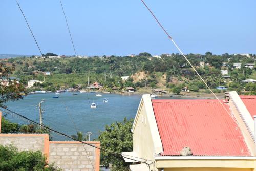 a view of a body of water with boats in it at Centre Lucien Botovasoa in Diego Suarez