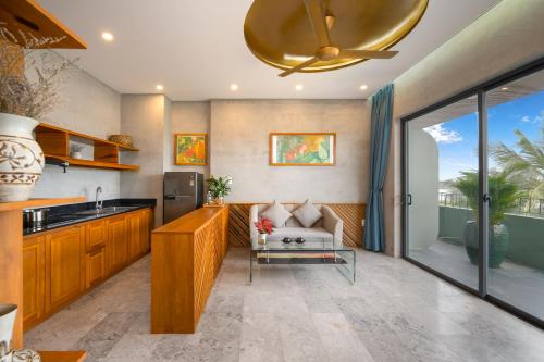 Η κουζίνα ή μικρή κουζίνα στο Bon Sand Villa & Spa Hoi An