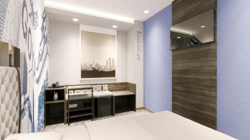 a bathroom with a sink and a mirror at Travelodge Nagoya Sakae in Nagoya