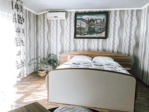 Postel nebo postele na pokoji v ubytování Koral Hotel