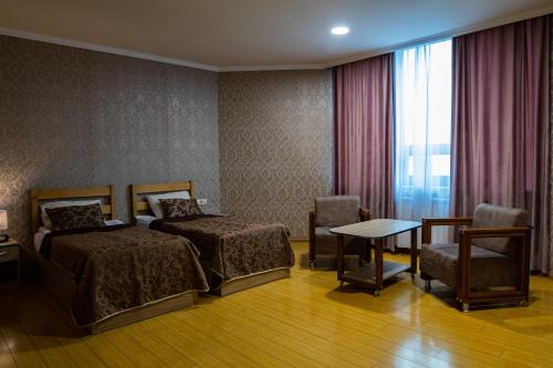  Inga Hotel Yerevan -  Room  picture :   Tea/Coffee maker    Minibar    Shower                           