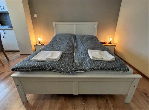 Postel nebo postele na pokoji v ubytování Hanna Apartman