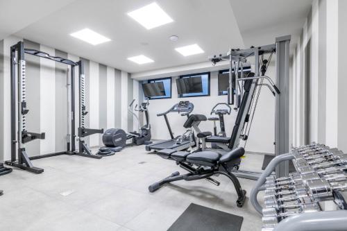 The fitness centre and/or fitness facilities at ALTIDO San Cristoforo - Terrace, Gym & SPA