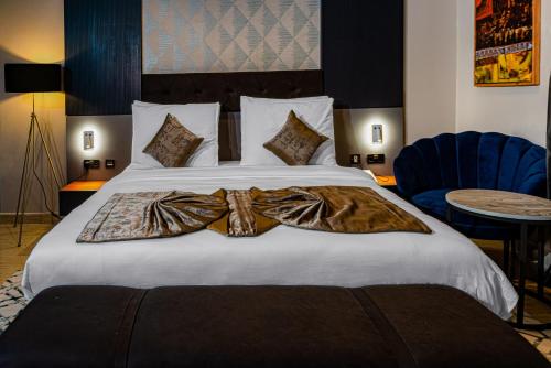 Letto o letti in una camera di Wali's Suites
