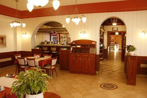 Reštaurácia alebo iné gastronomické zariadenie v ubytovaní Penzion Poříčí