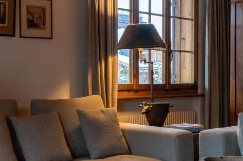 Ein Sitzbereich in der Unterkunft Cozy Place in Gstaad center