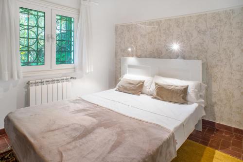 Postel nebo postele na pokoji v ubytování La Veguetilla