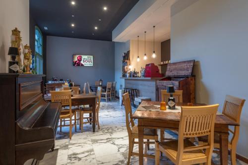 TV a/nebo společenská místnost v ubytování Hotel Roma