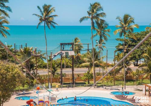 Bazén v ubytování PSP Resort All Inclusive nebo v jeho okolí