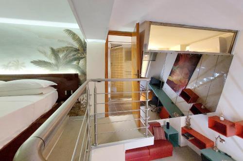 a room with a staircase leading to a bedroom at Loft Margutta per Smart Worker in Rome