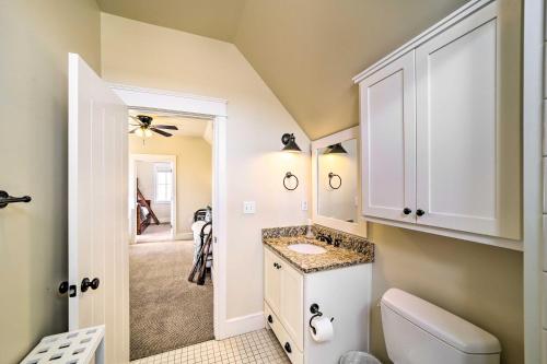 a bathroom with a toilet and a sink at Carlton Landing Home Walk to Lake and Parks! in Canadian