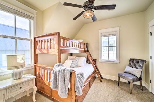 a bedroom with a bunk bed and a ceiling fan at Carlton Landing Home Walk to Lake and Parks! in Canadian