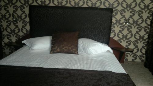 Postel nebo postele na pokoji v ubytování Family Hotel Yagoda88