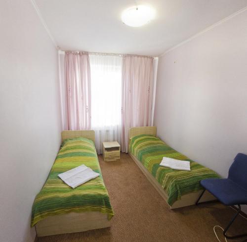 Postel nebo postele na pokoji v ubytování Motel
